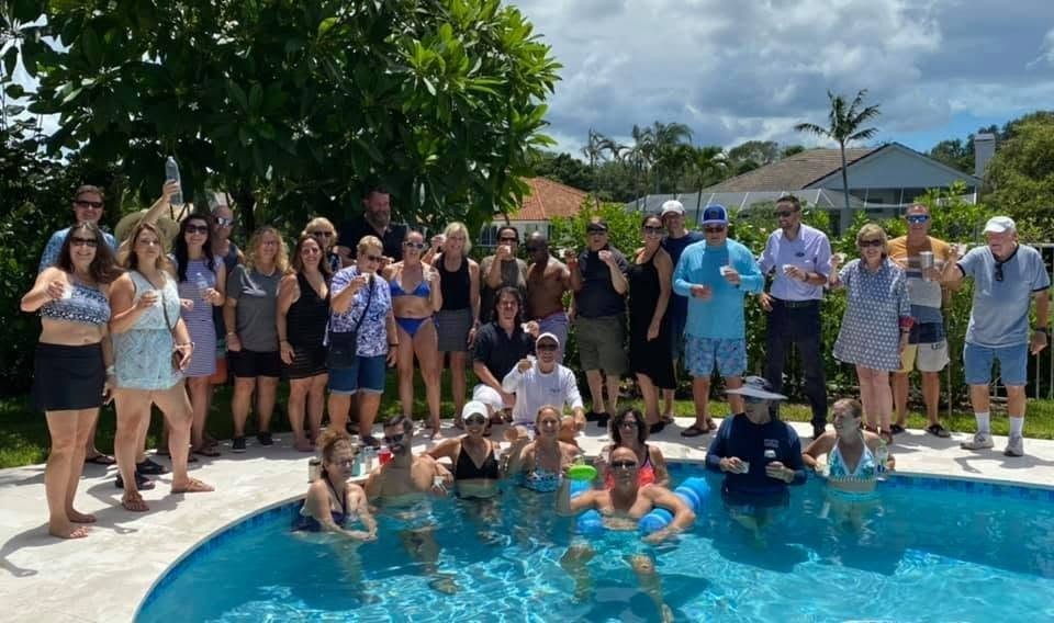 EPIC! members at a poolside celebration